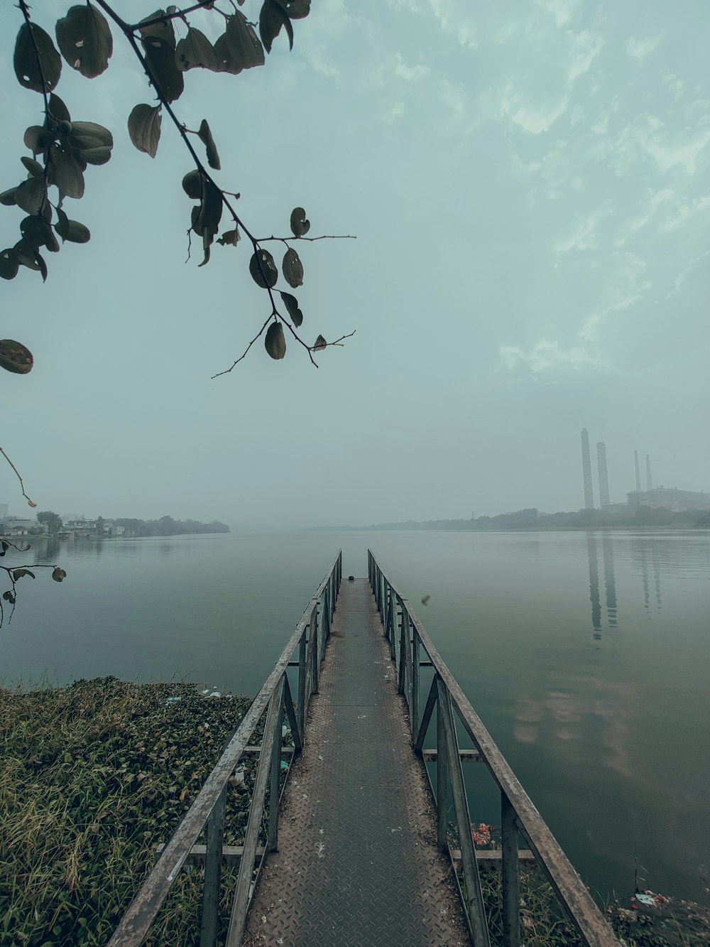 a wooden bridge over a body of water