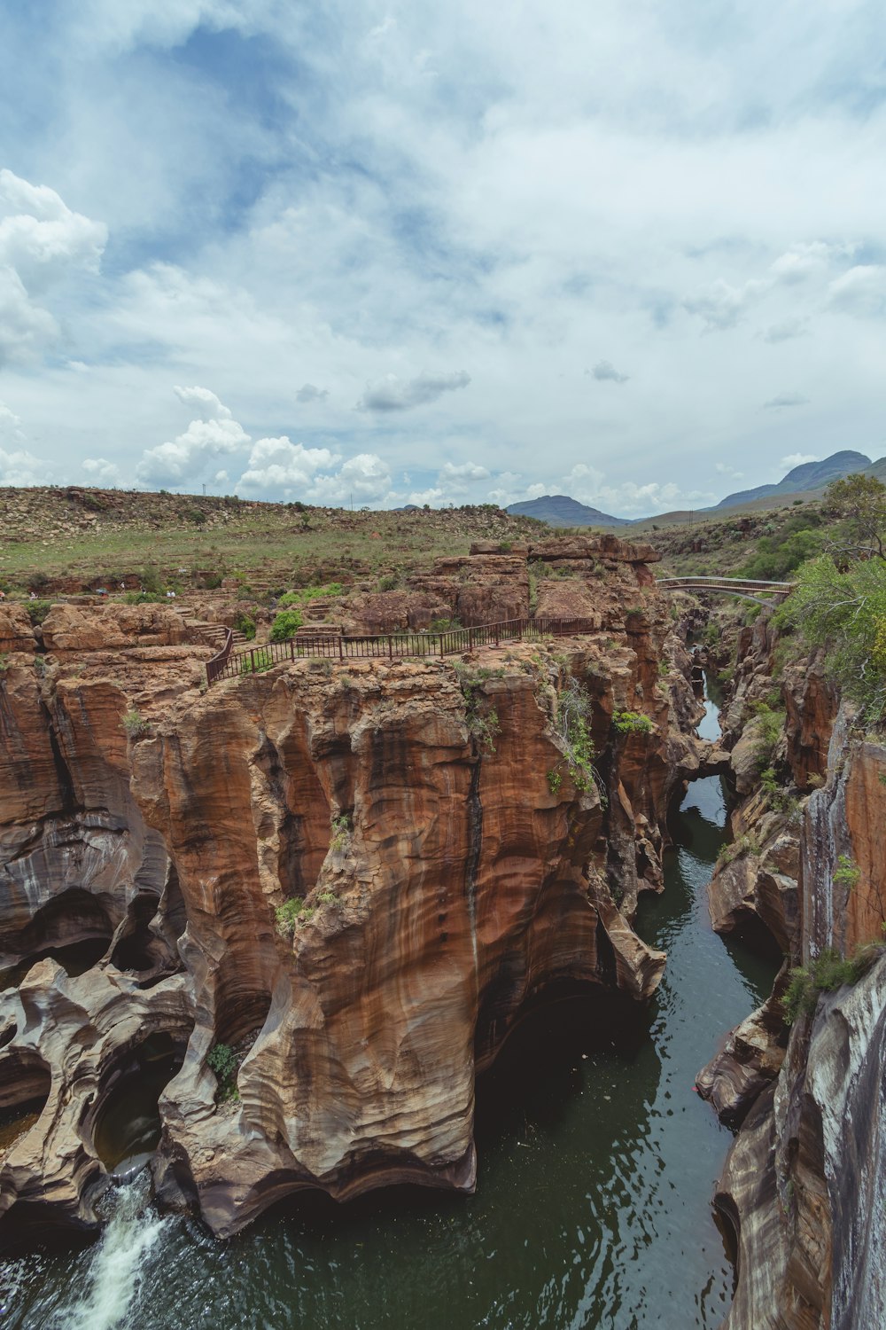 a large body of water surrounded by rocky cliffs