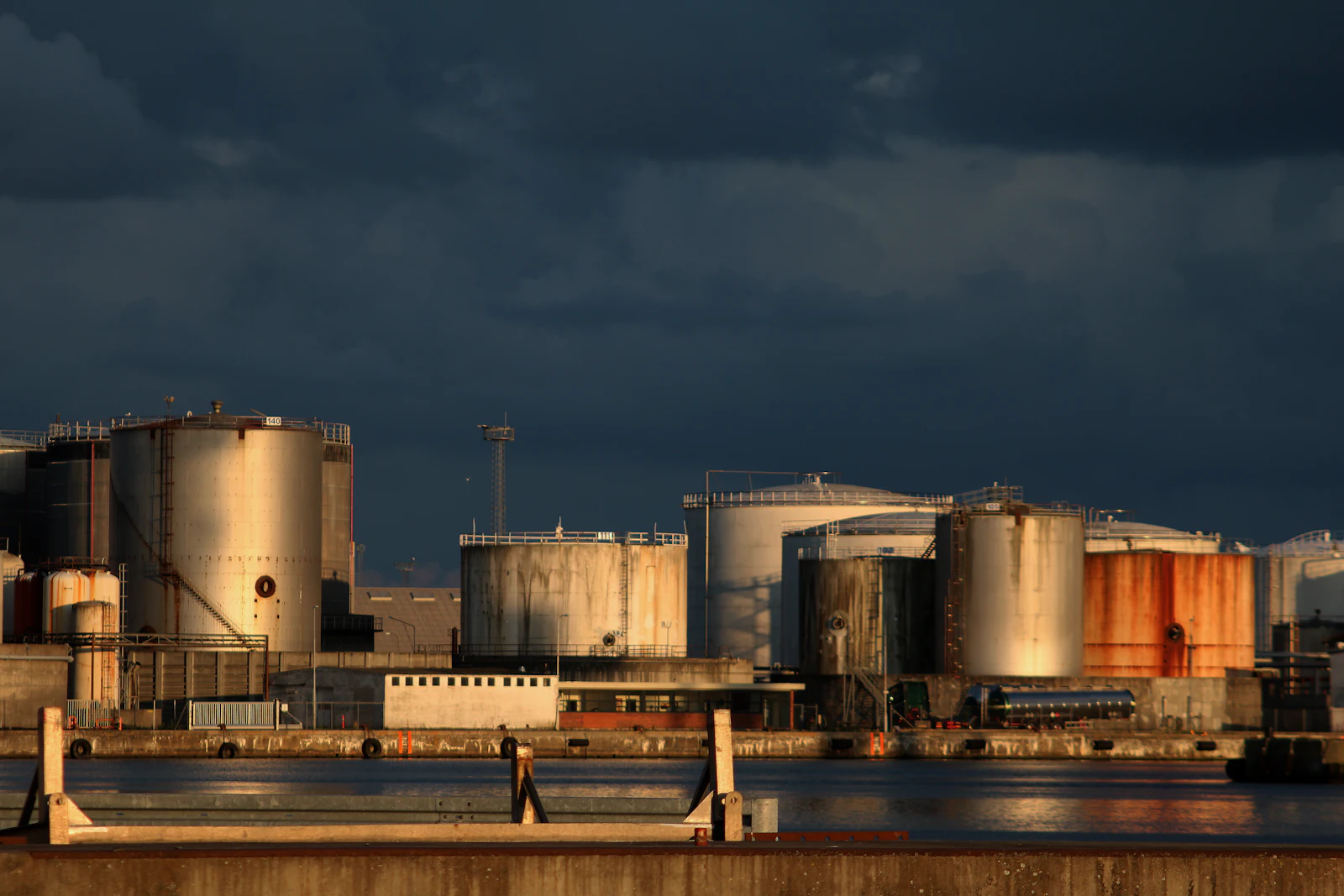 Industrial site beside a body of water