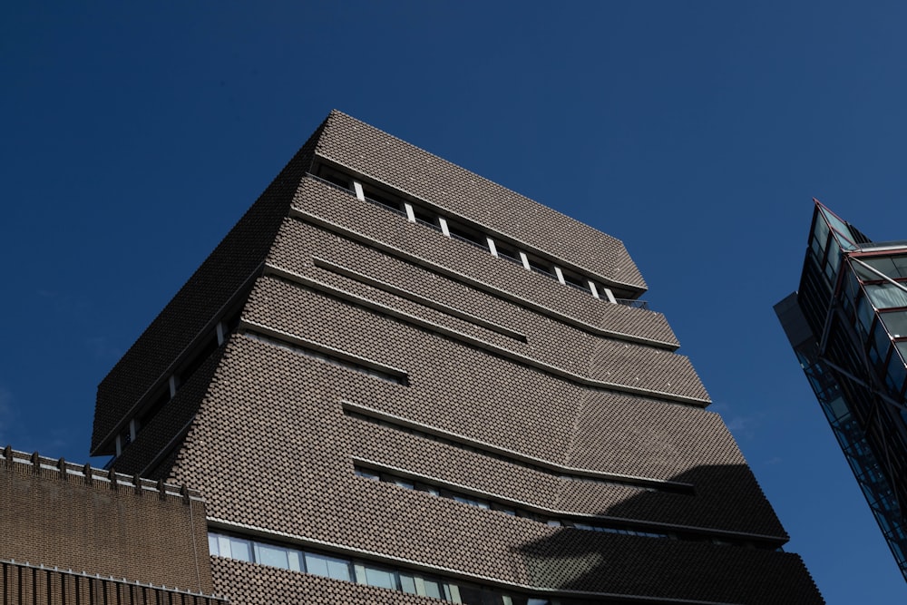 a tall building with a clock on the side of it