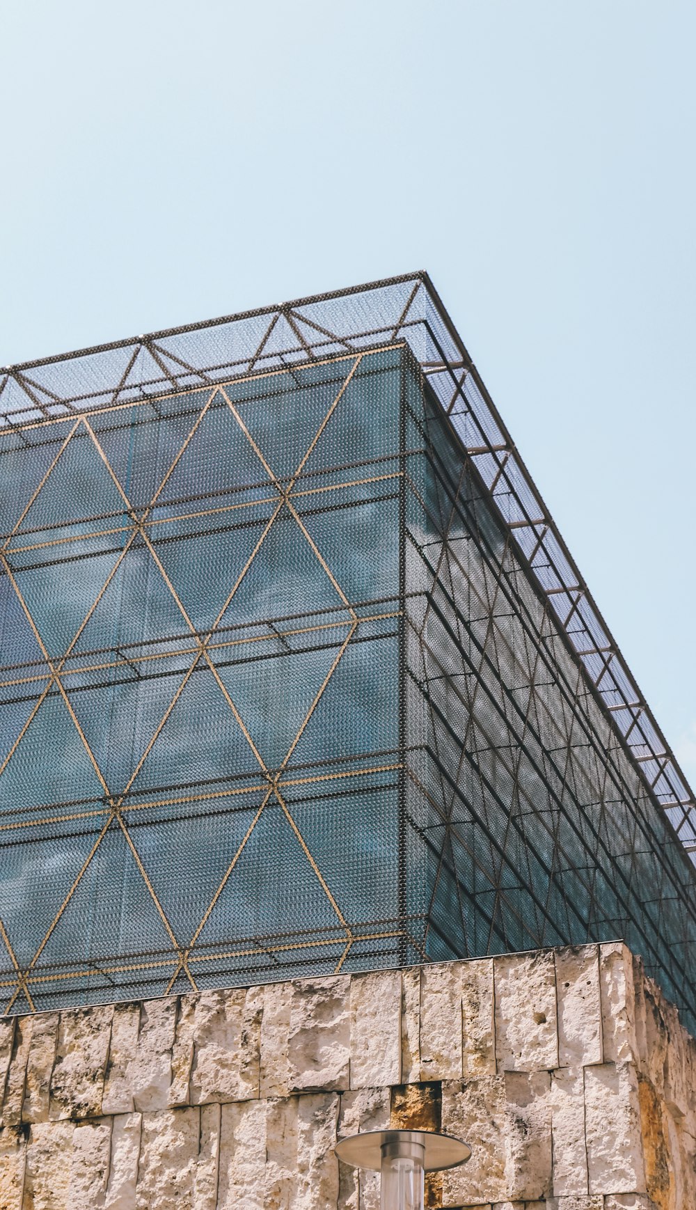 a very tall building with a glass front