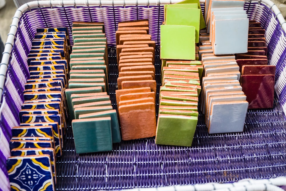 a basket filled with lots of different colored items