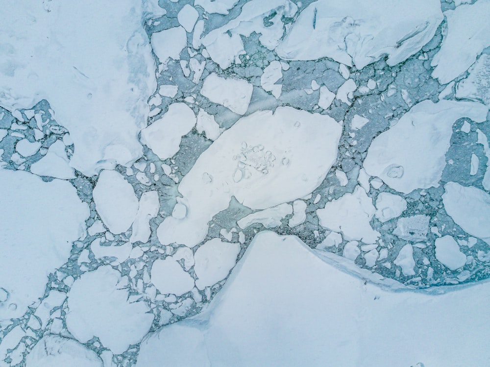 an aerial view of a snow covered area