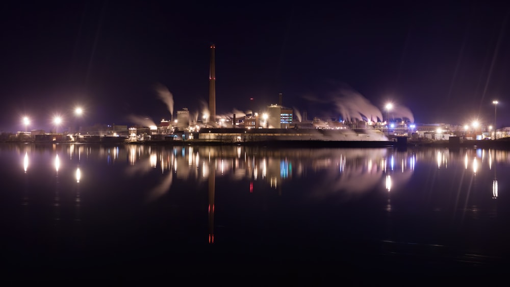 a large ship in a harbor at night