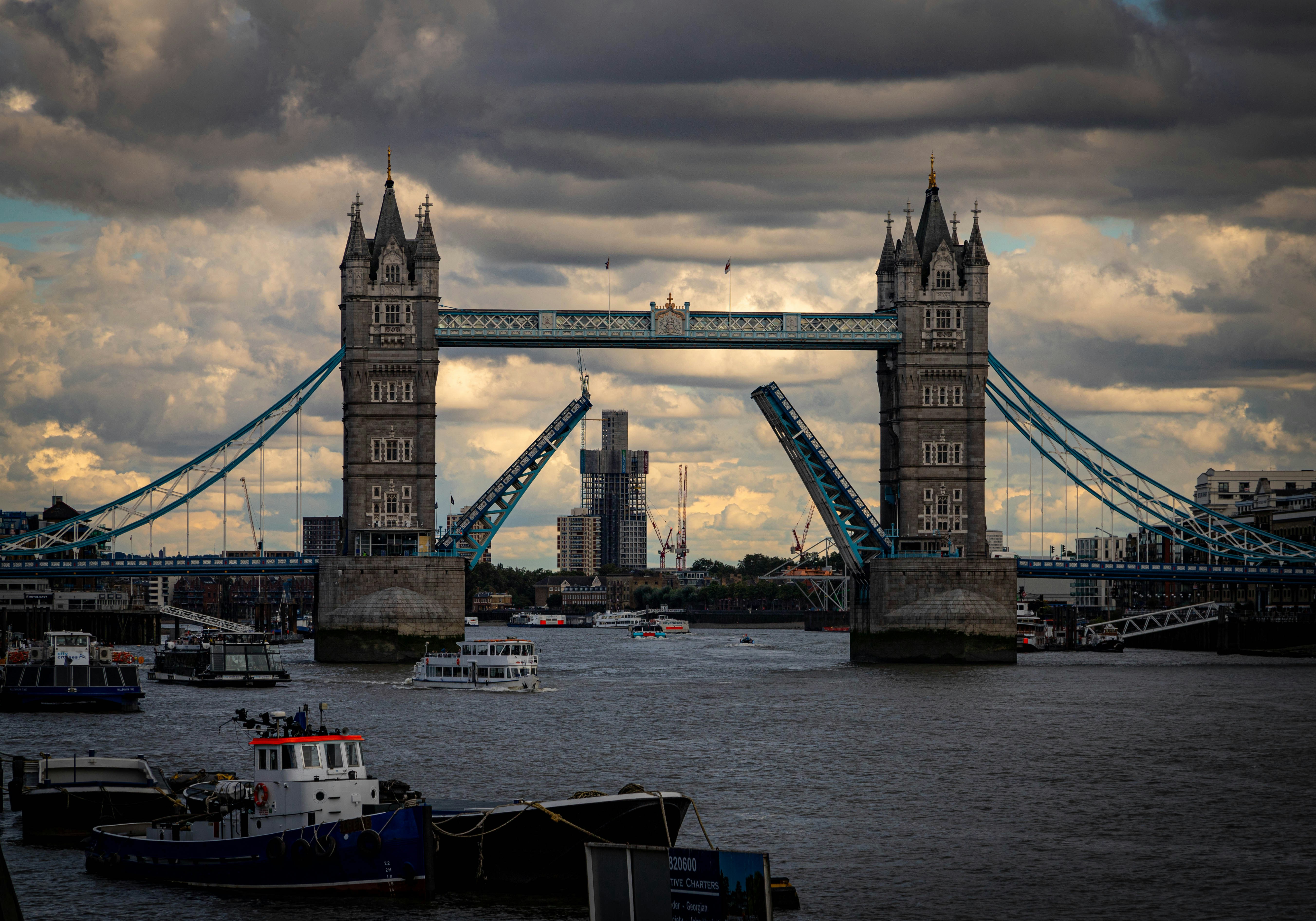 a view of the tower bridge from across the river, 