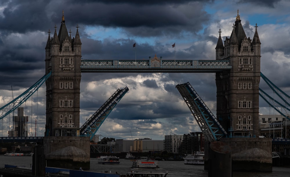 a bridge with a sky background and clouds in the sky