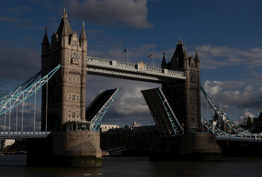 a tall bridge with a sky in the background