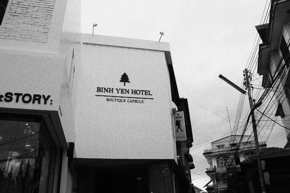 a black and white photo of a store front