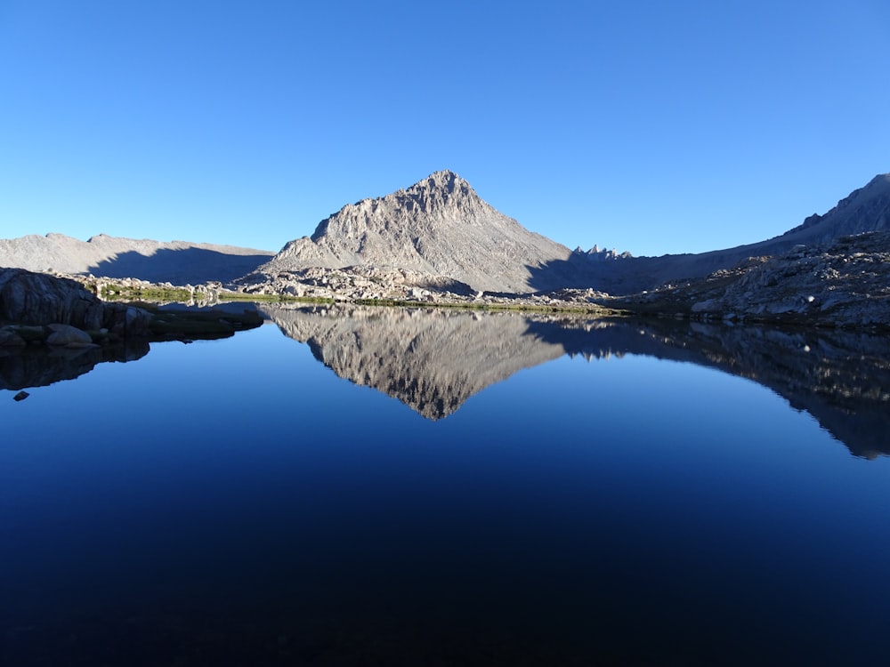 a large body of water surrounded by mountains