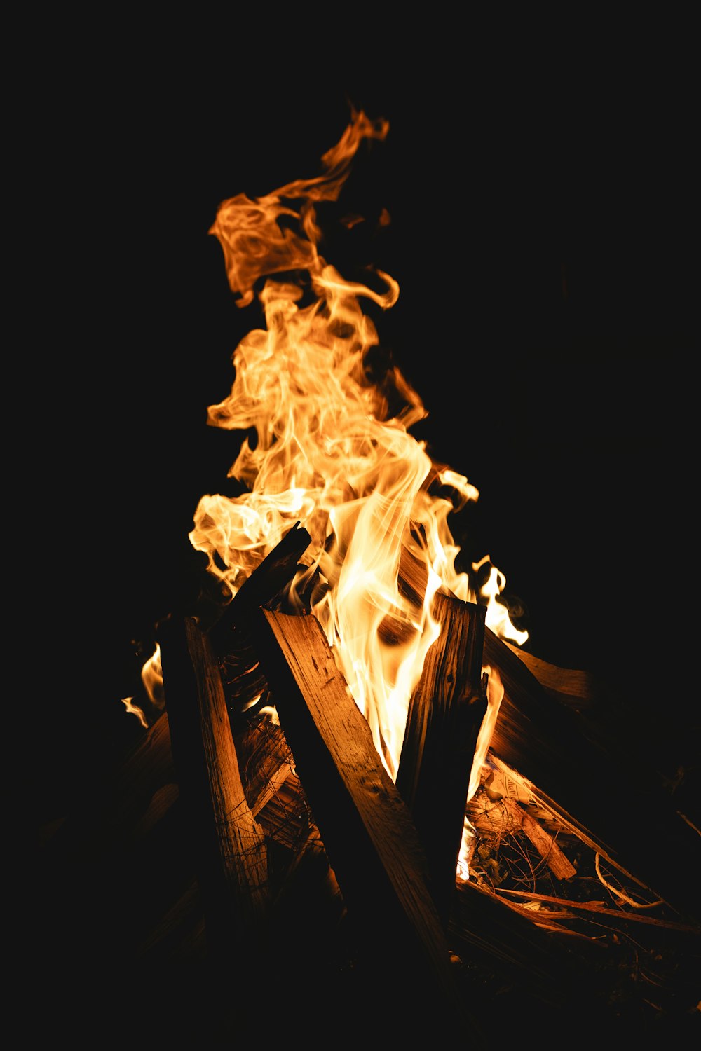 a close up of a fire in the dark