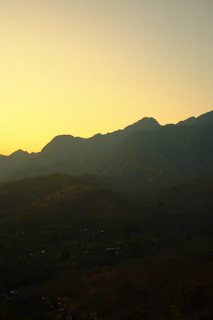 A serene digital landscape of soft beige hills under a calm taupe sky, perfect for a Samsung Frame TV.