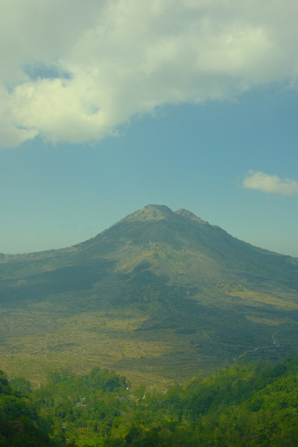 a view of a mountain from a distance