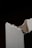 A close-up view of a broken piece of white plaster or ceramic material with rough, jagged edges against a dark background.