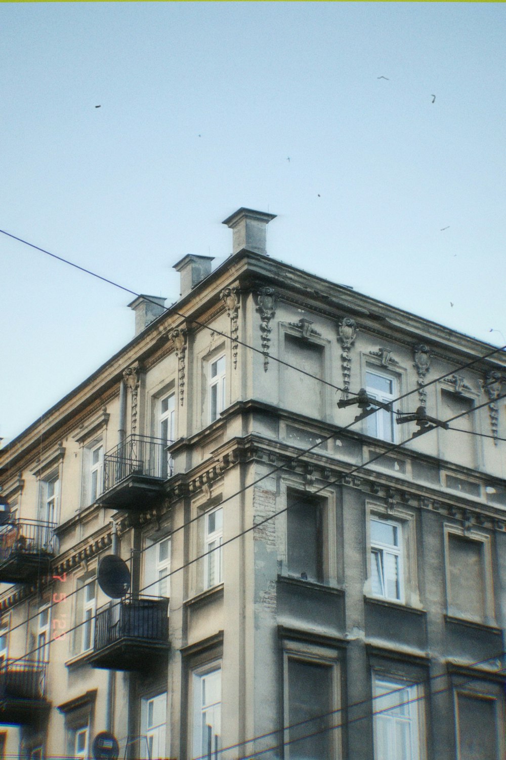 an old building with a balcony and balconies