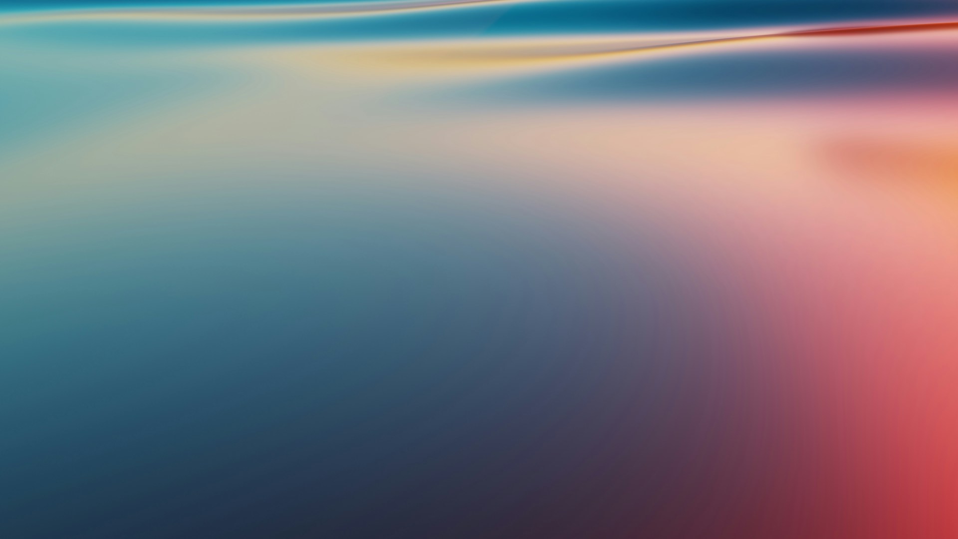 a blurry image of a blue, red, and yellow background