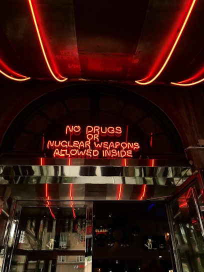 A clean event space with signs indicating prohibited items.