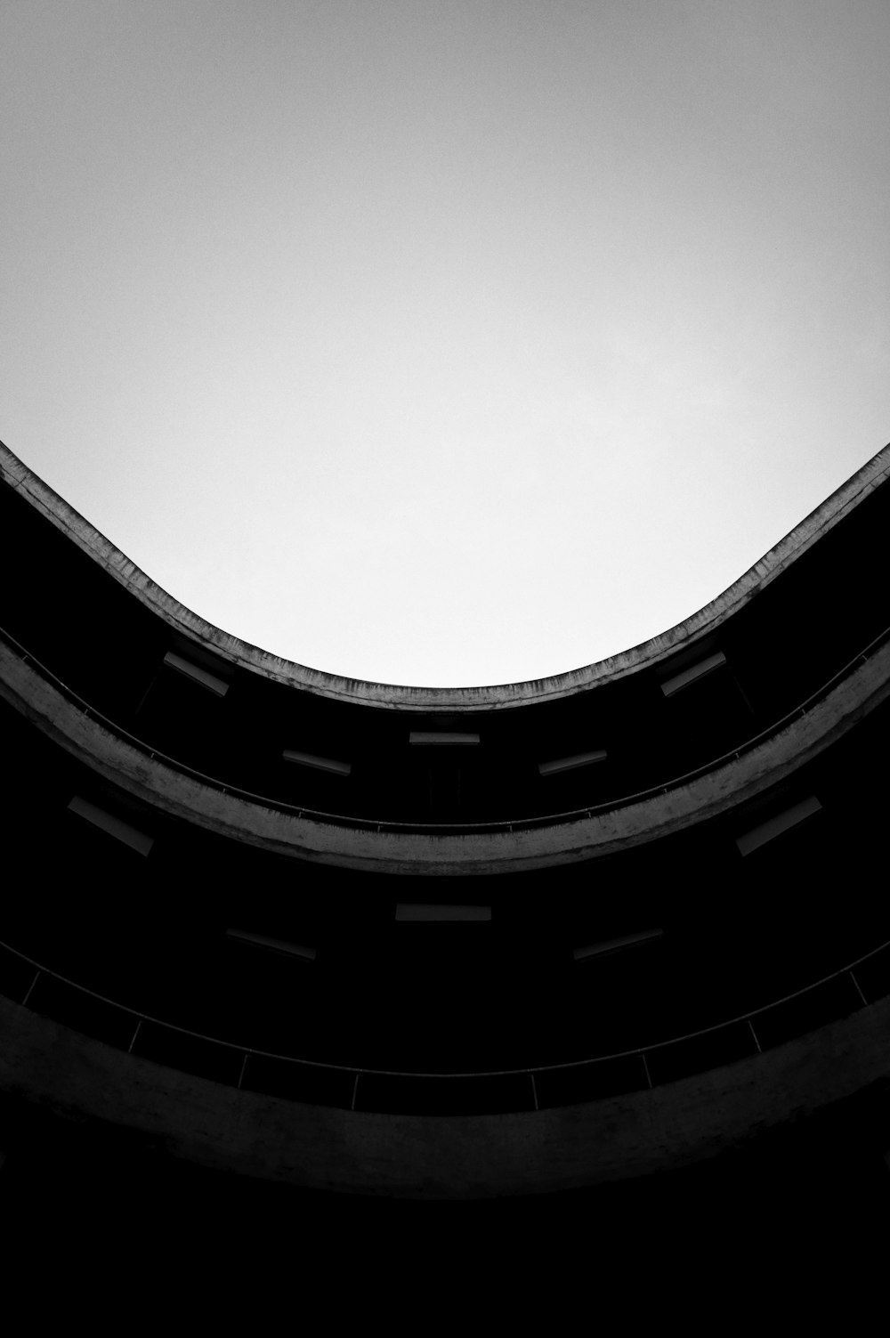 a black and white photo of a clock tower