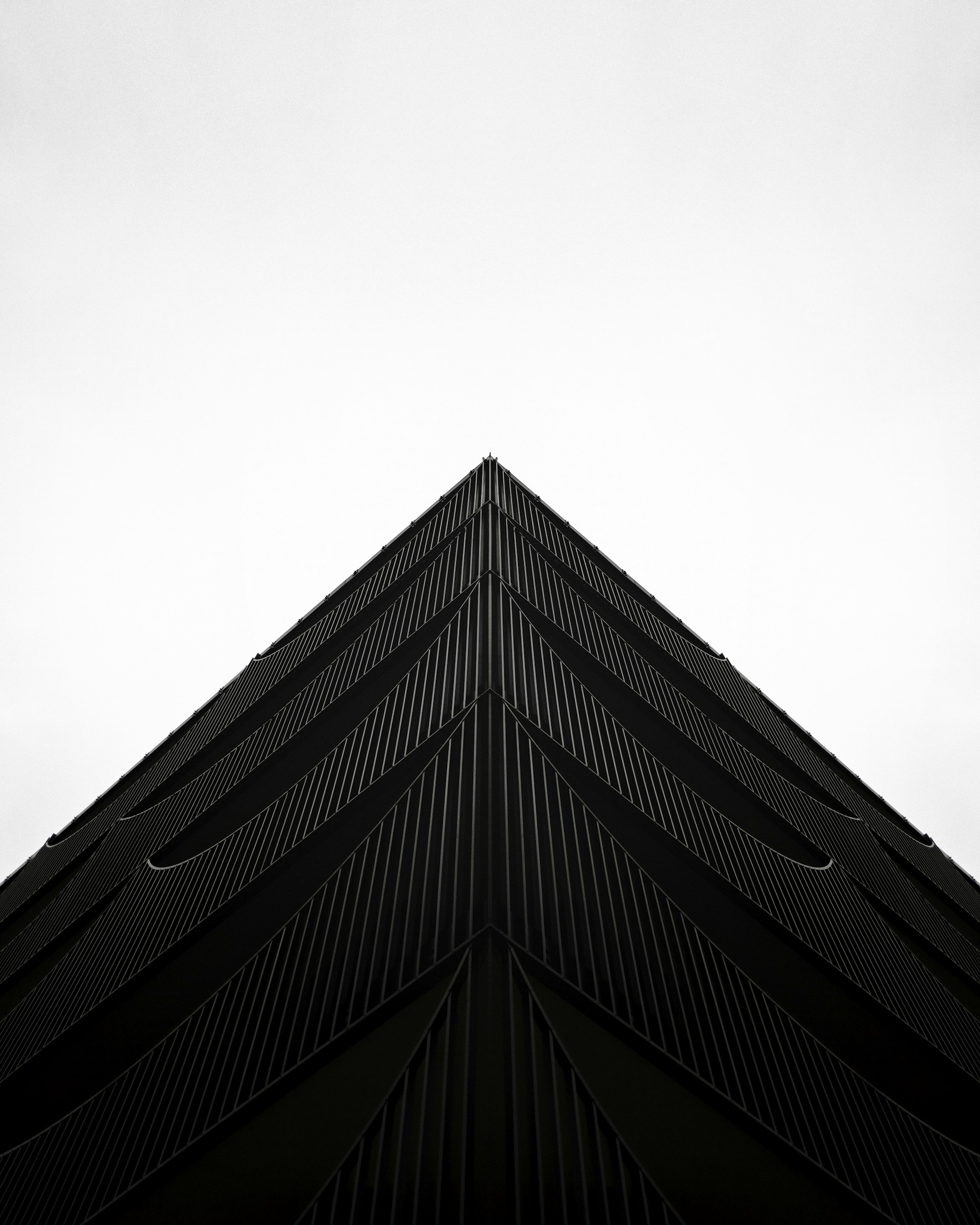 a black and white photo of the top of a building