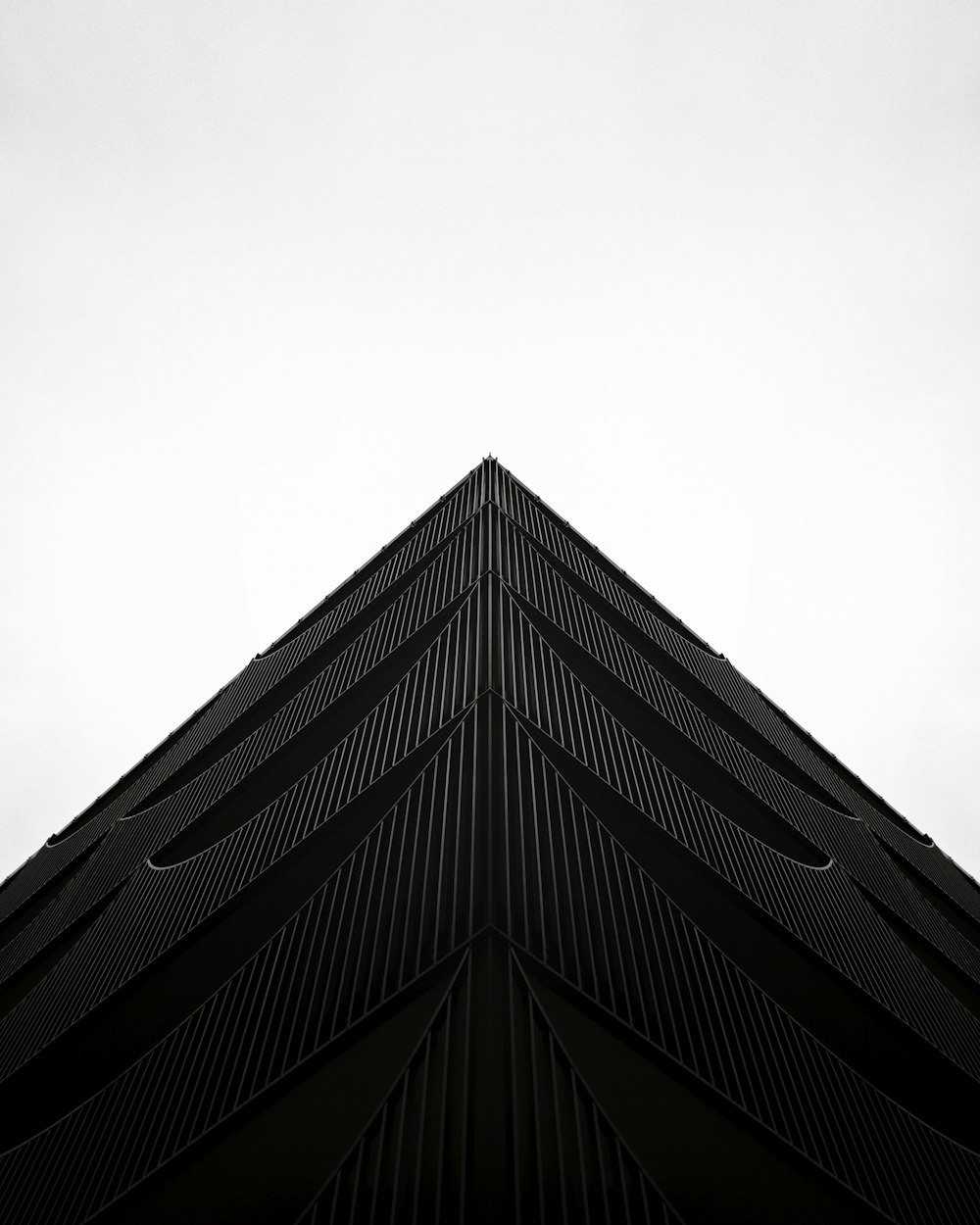 a black and white photo of the top of a building