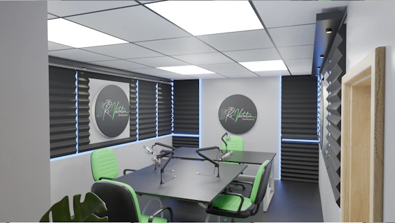 A microphone in a cozy podcast studio with headphones and sound panels.