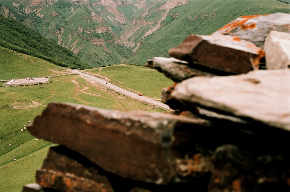 a view of a valley and mountains from a high point of view