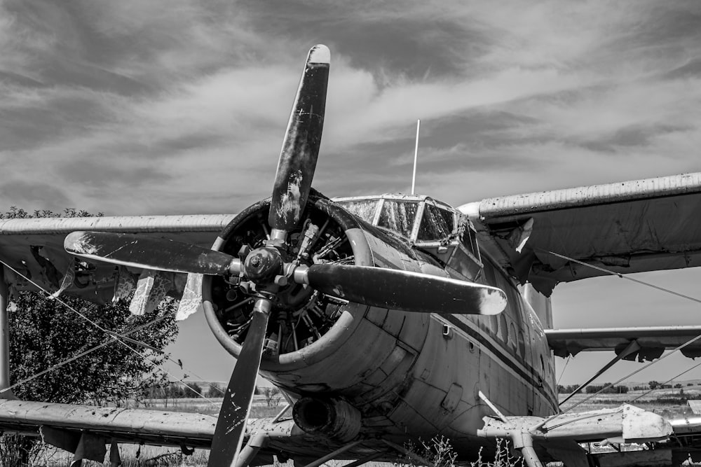 a black and white photo of an old airplane