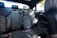 A clean, shiny car interior with vacuumed seats and polished surfaces.