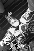 A group of friends wearing trendy high-top shoes outdoors.