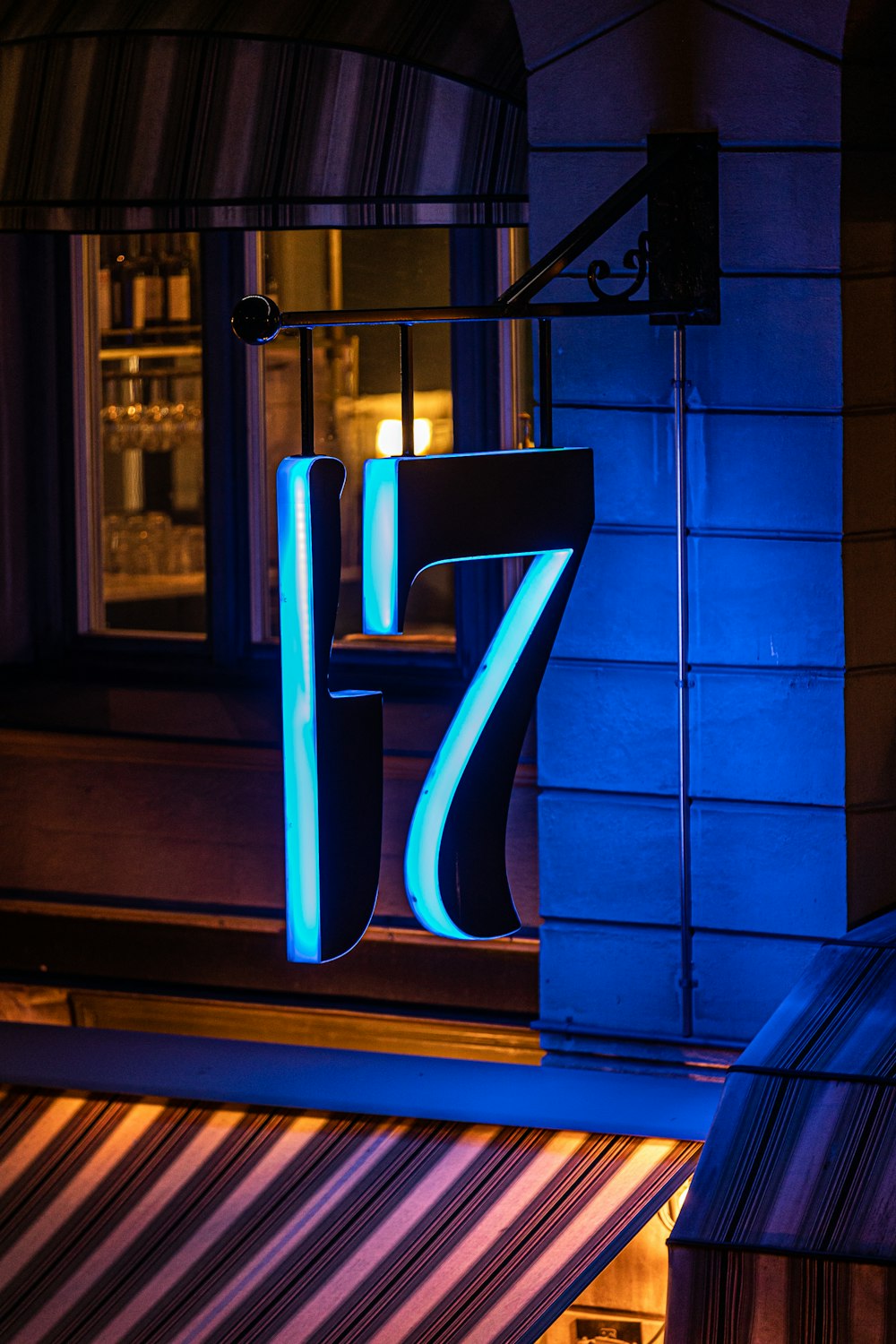 a building with a lit up number seven on it