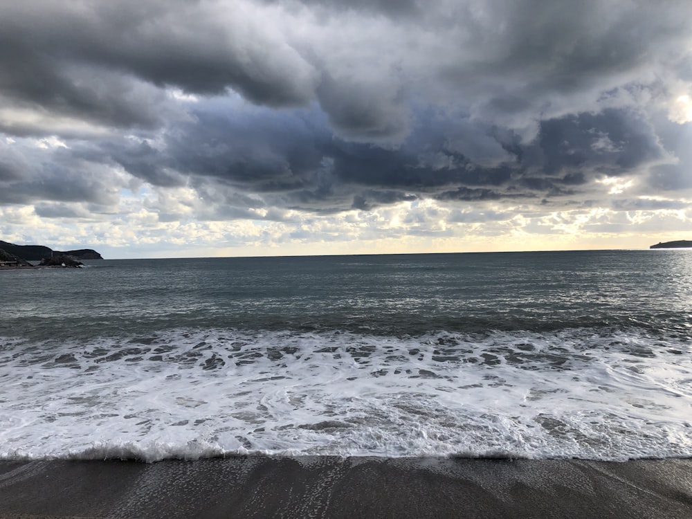 a view of the ocean from a beach