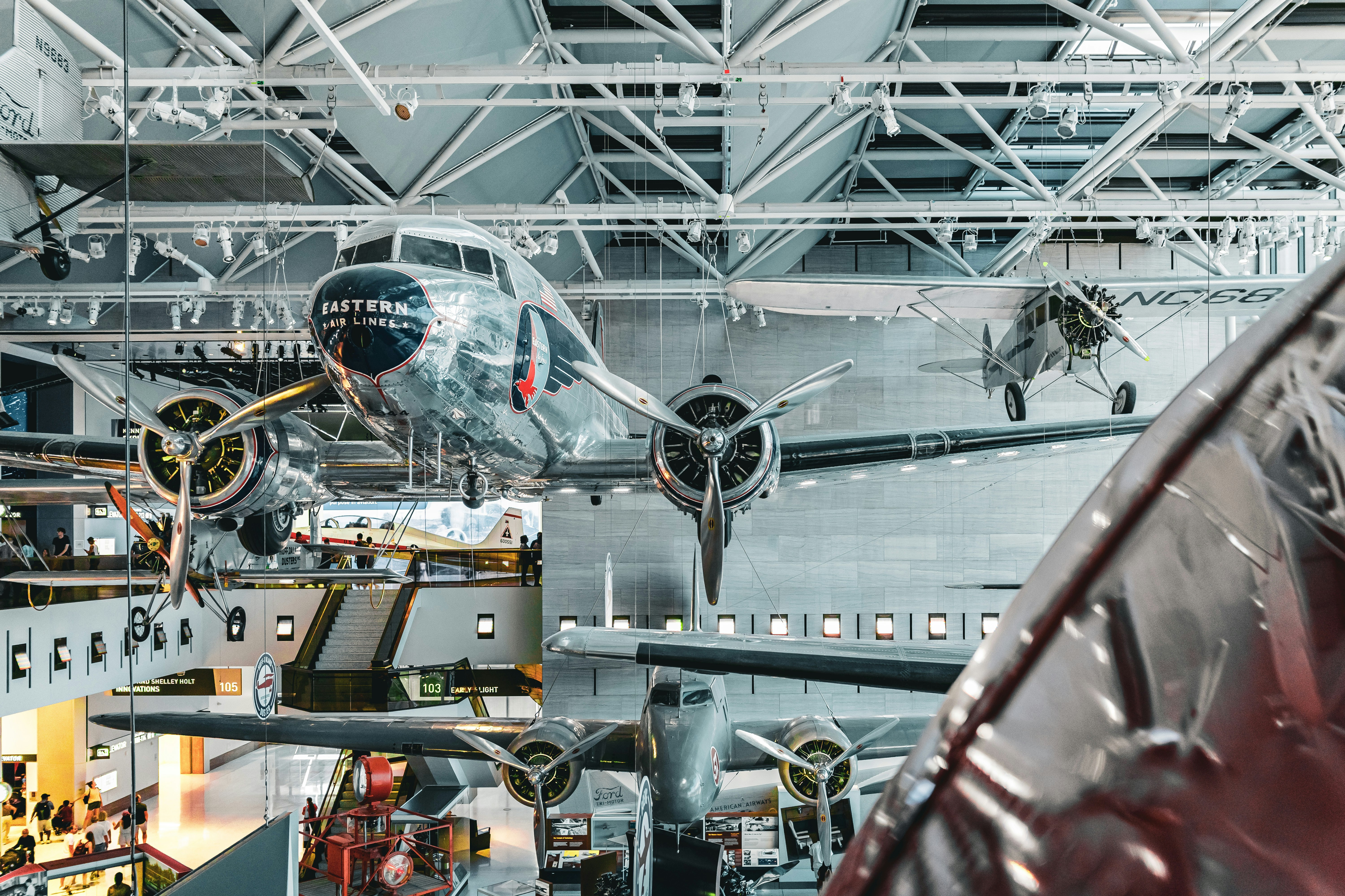 a large airplane hanging from the ceiling of a building, Smithsonian Air and Space Museum