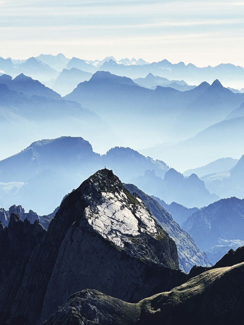 a view of mountains from the top of a mountain