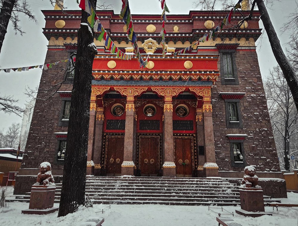 a building with a lot of snow on the ground