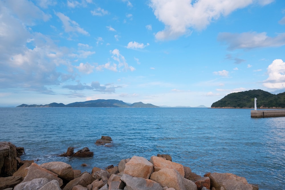 a large body of water surrounded by rocks