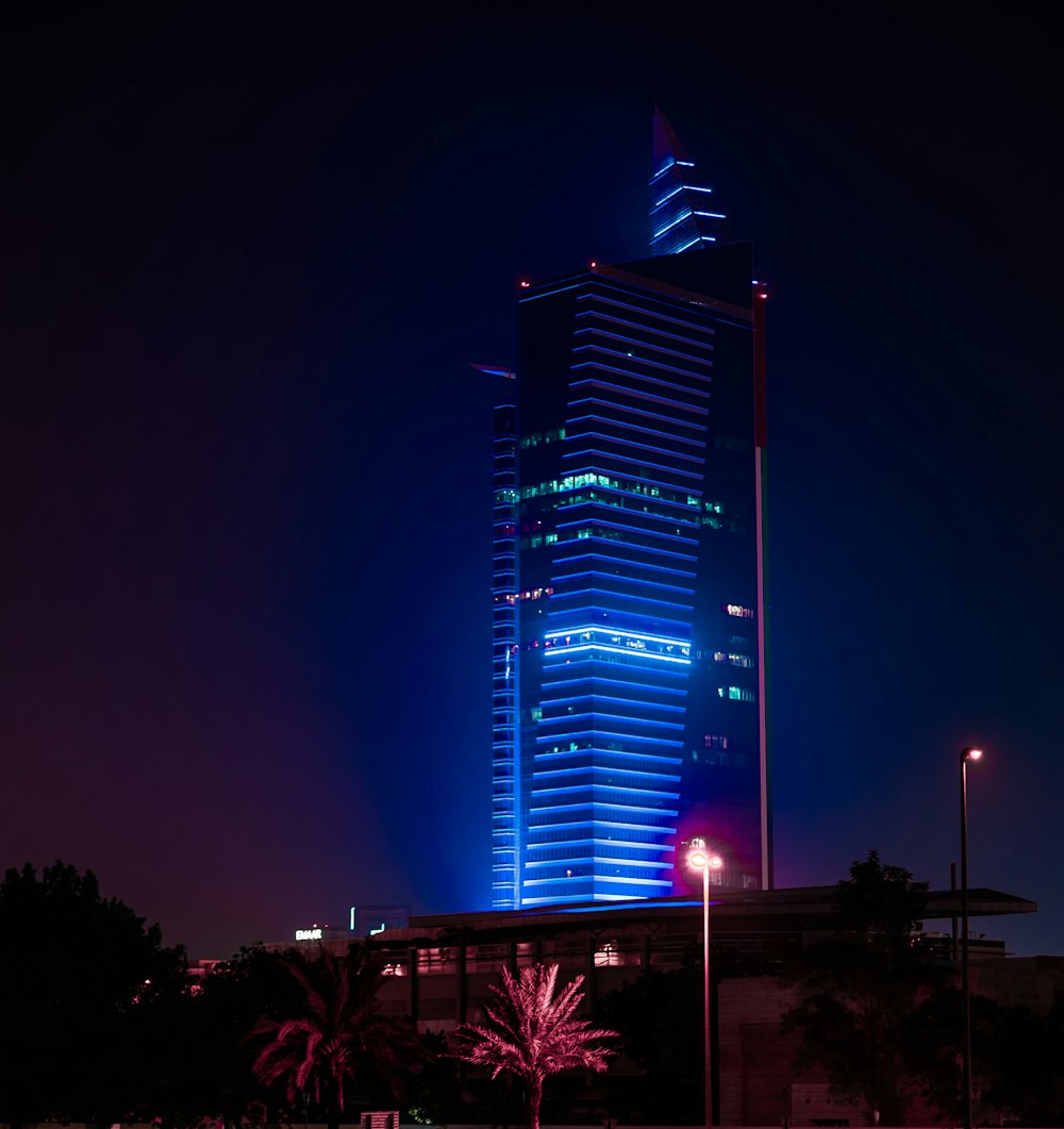 a very tall building lit up at night