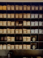 Rows of coffee and tea products neatly arranged on shelves