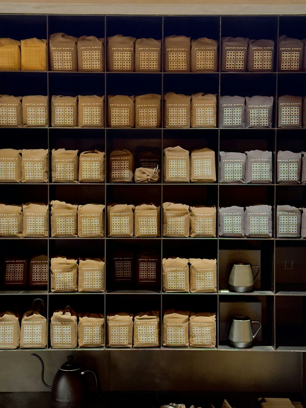 a shelf filled with lots of baskets and containers