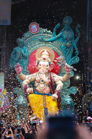 A vibrant Ganesh Chaturthi festival scene with colorful decorations and joyful devotees.