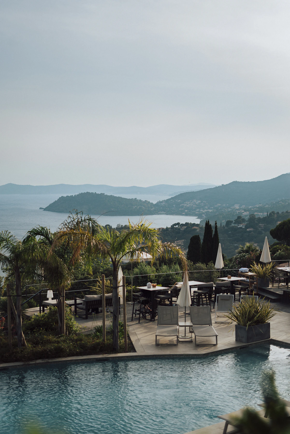 Pool beside a green hillside