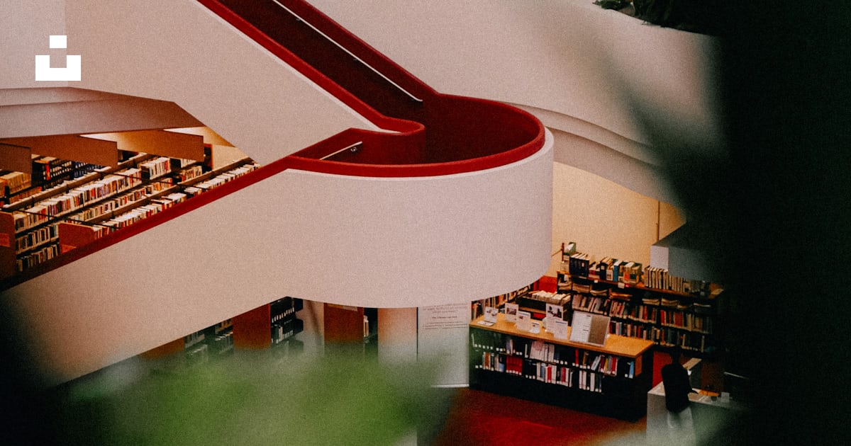 A view of a library from the top of a staircase photo – Free Library ...