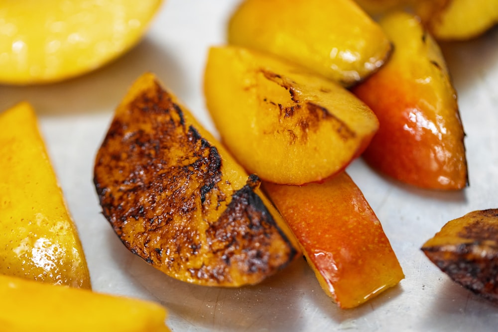 a close up of sliced fruit on a table