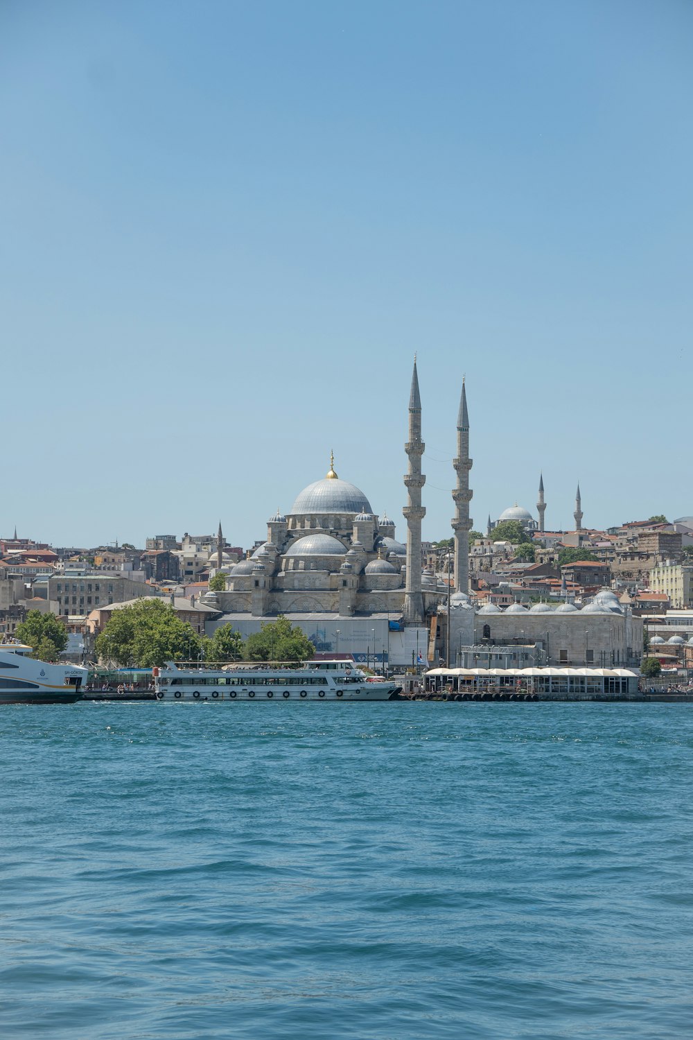 a view of a large building from across the water