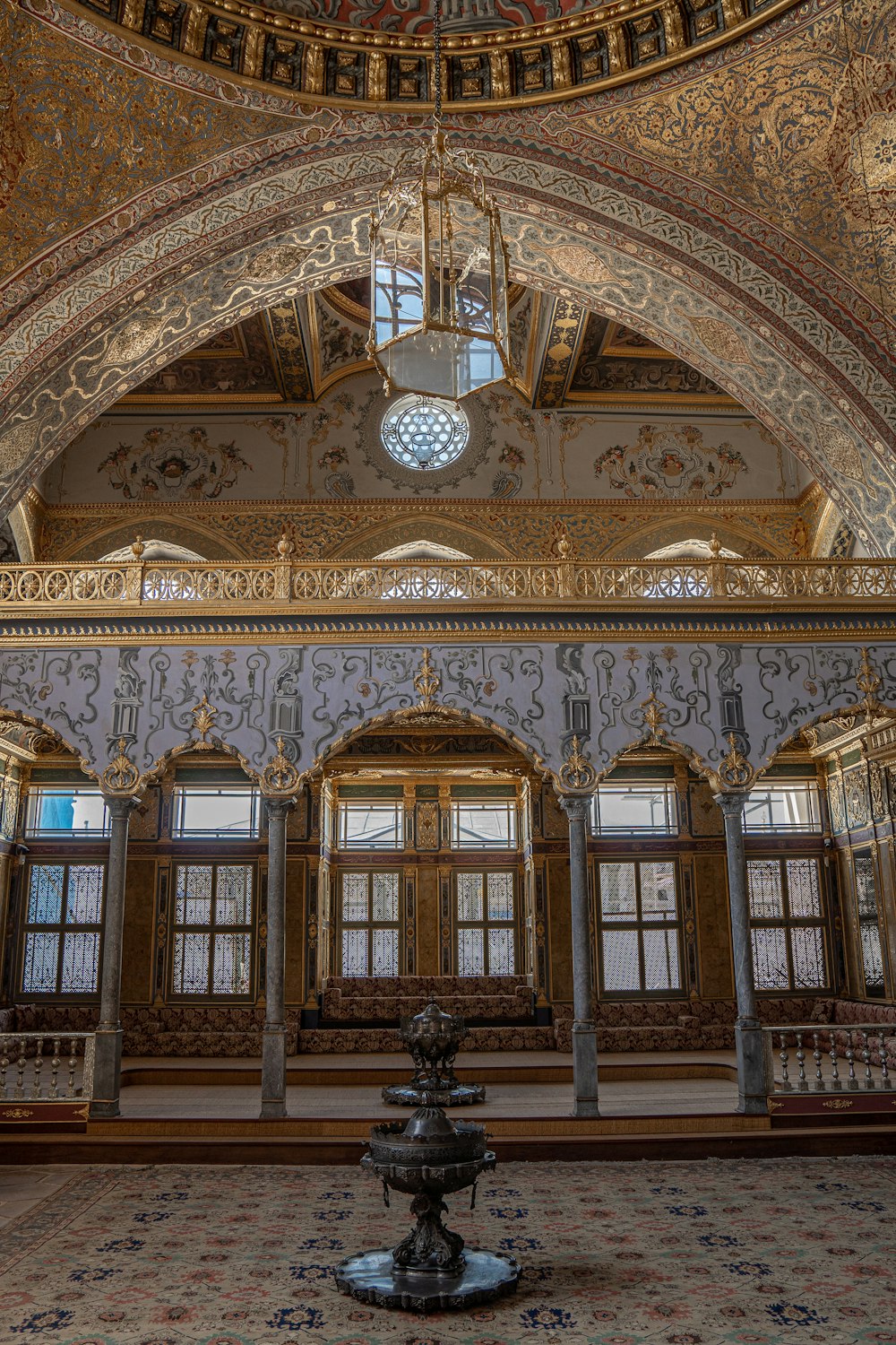 a large room with a fountain inside of it