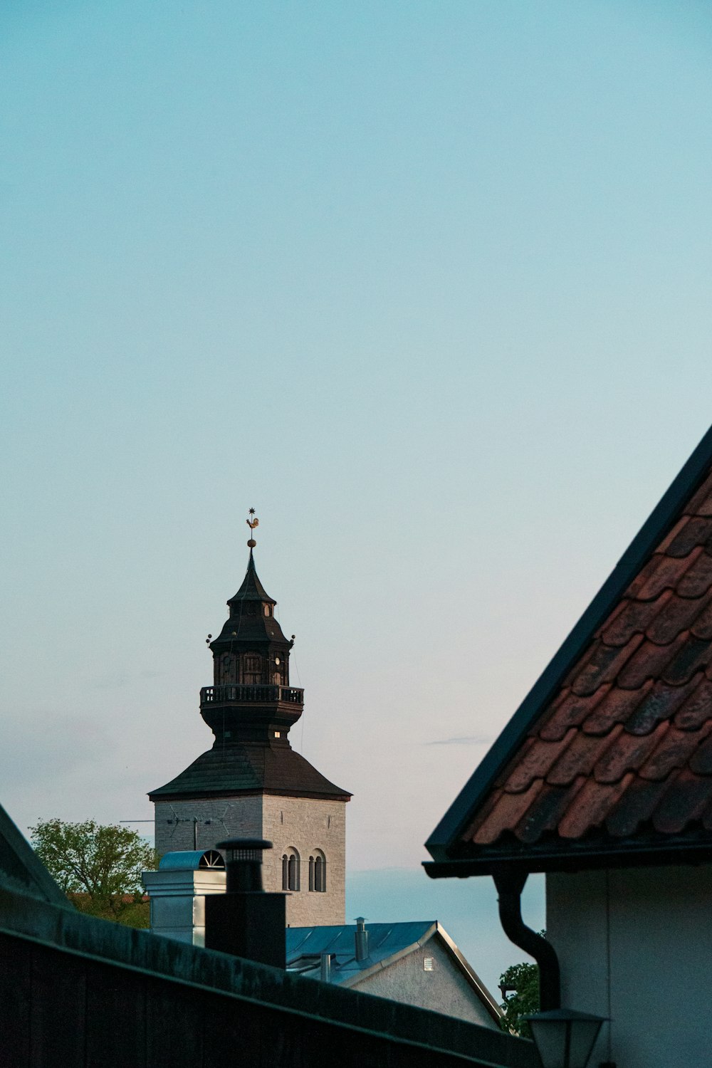 a tall tower with a clock on top of it