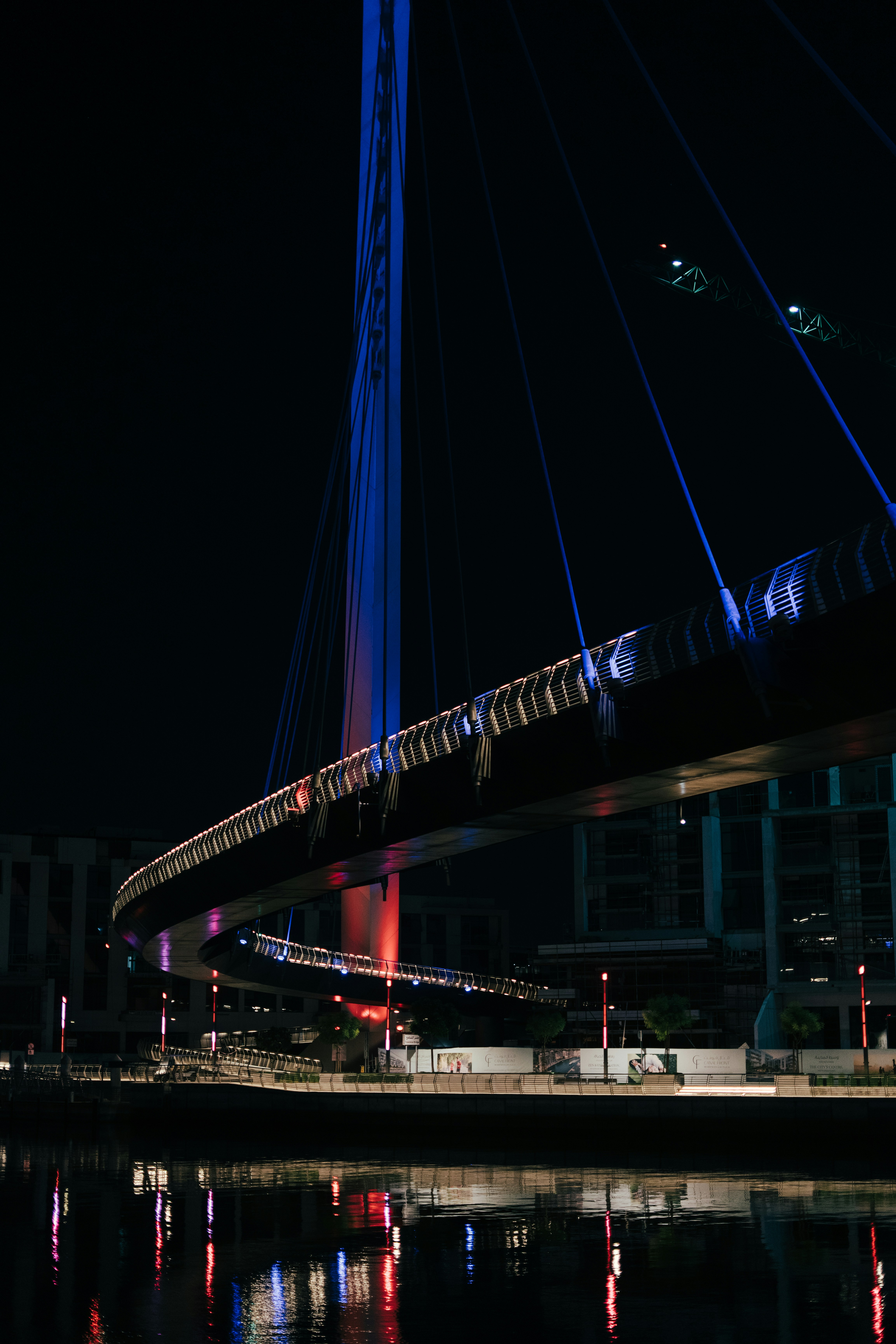 a bridge that is lit up at night