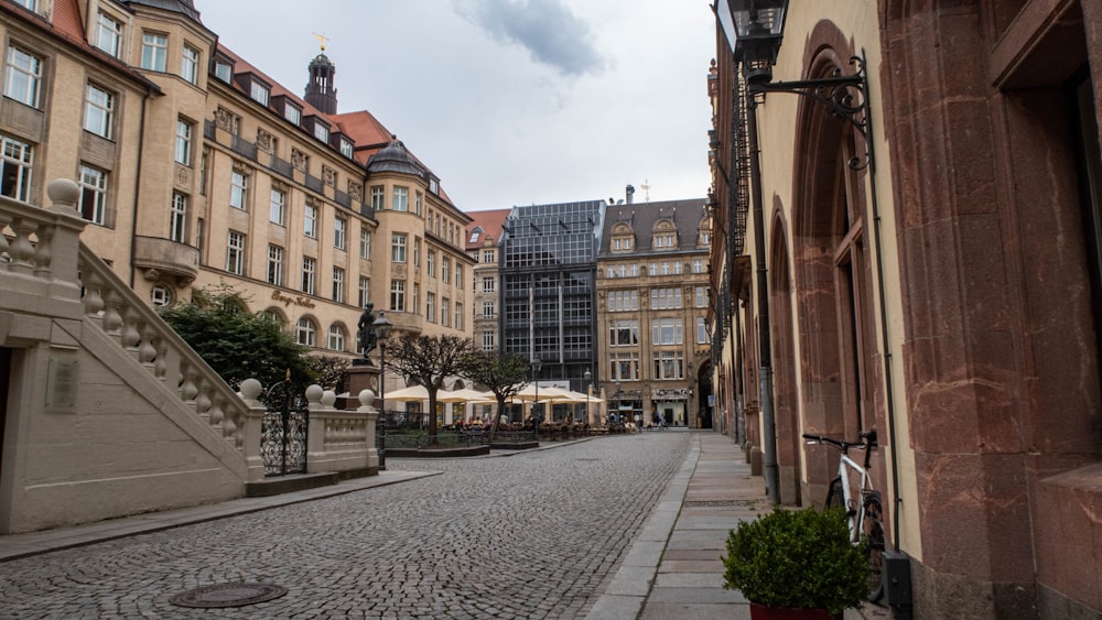 a cobblestone street in a european city