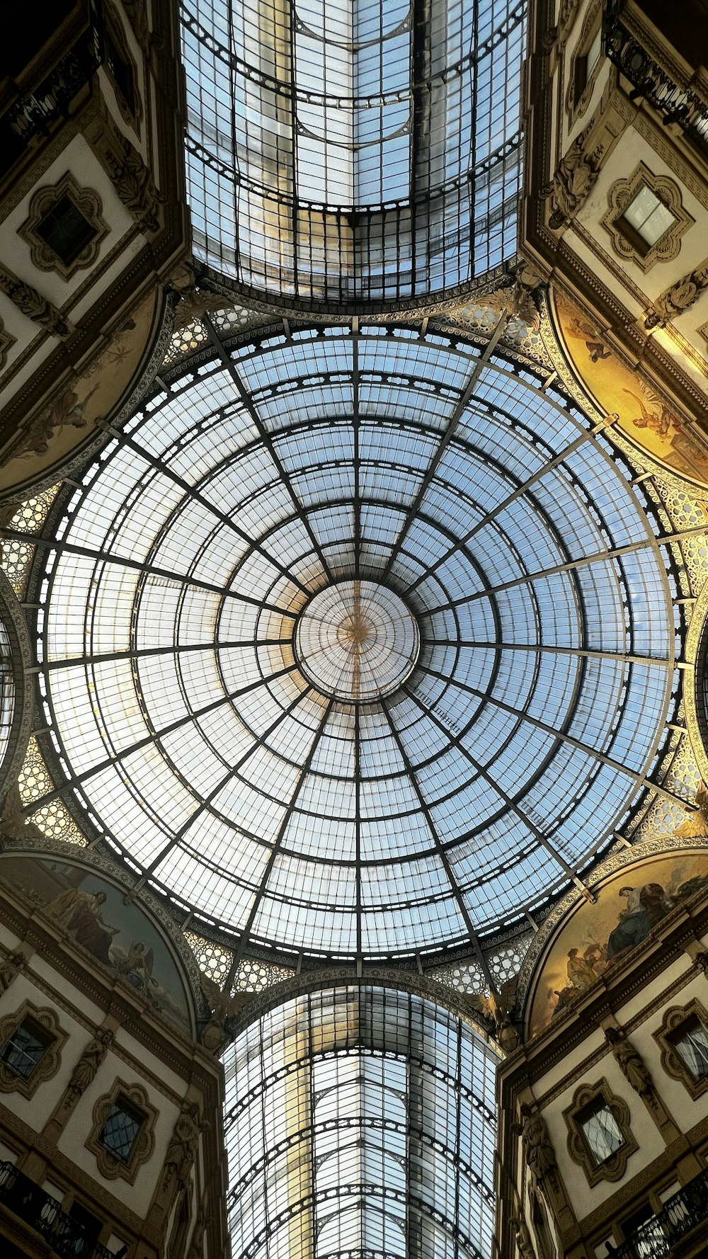 the ceiling of a building with a glass dome