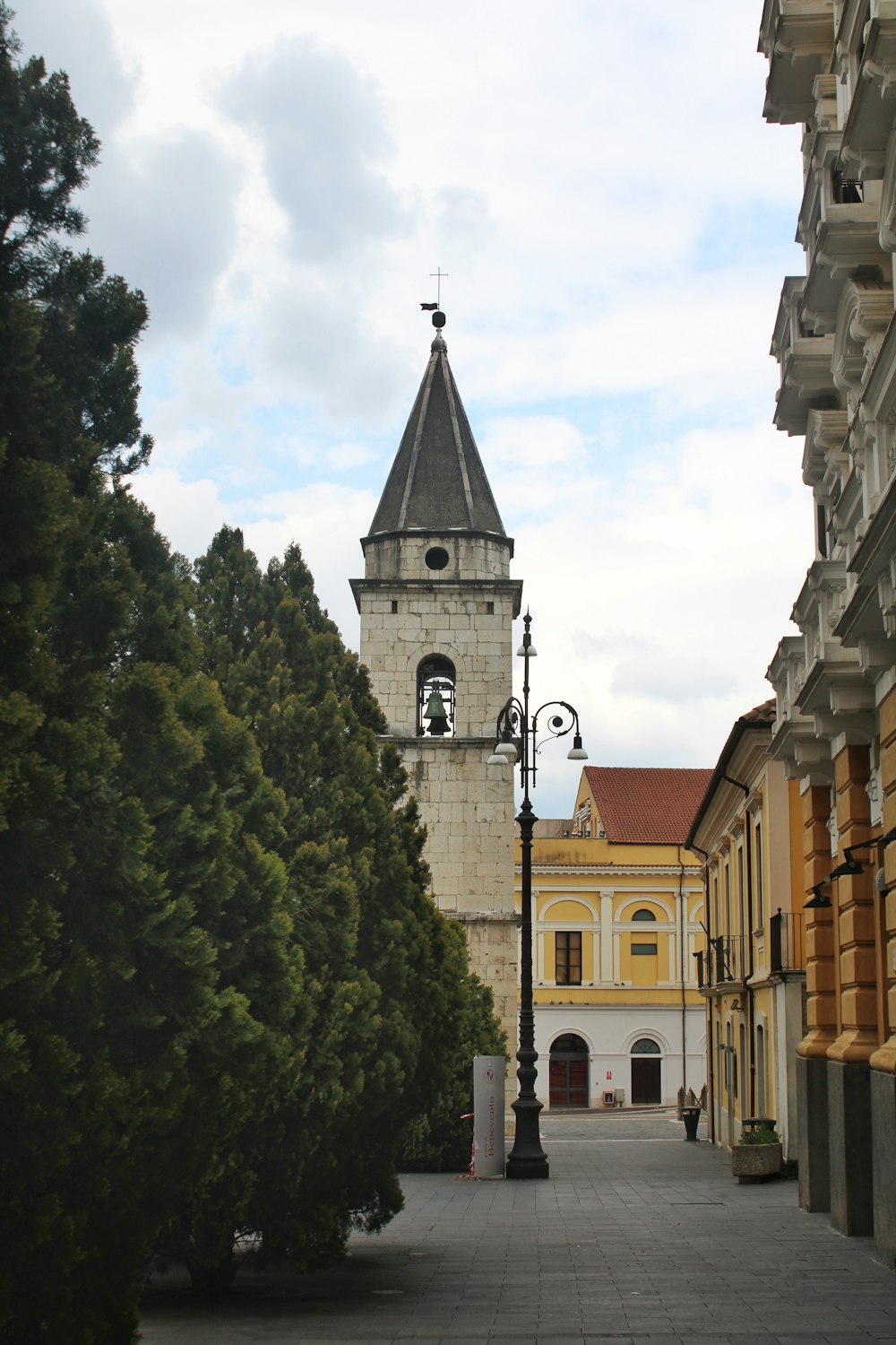 a tall clock tower towering over a city