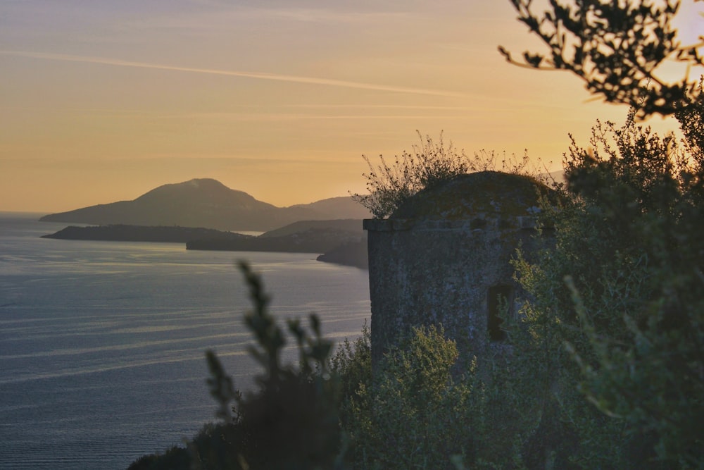 a view of a body of water at sunset