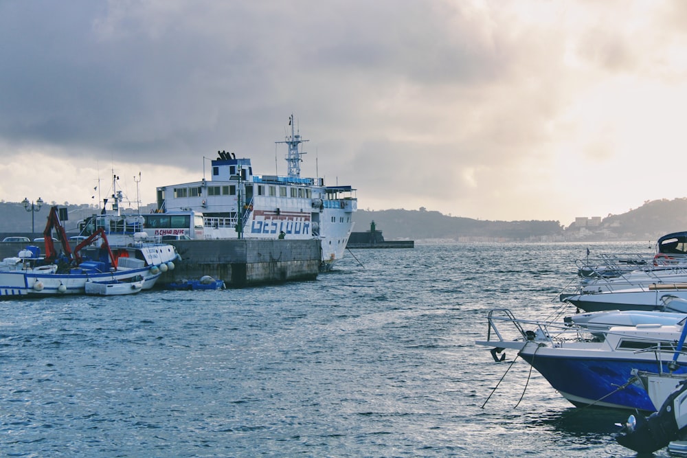 a group of boats that are sitting in the water